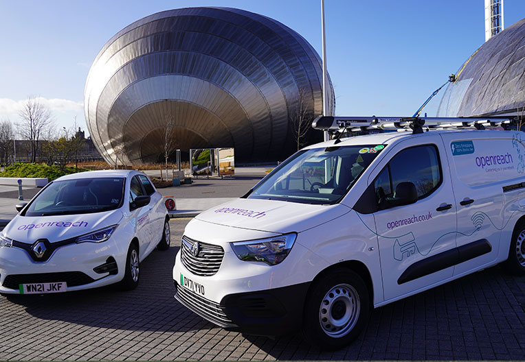 Two Openreach vans parked outside in the sunshine