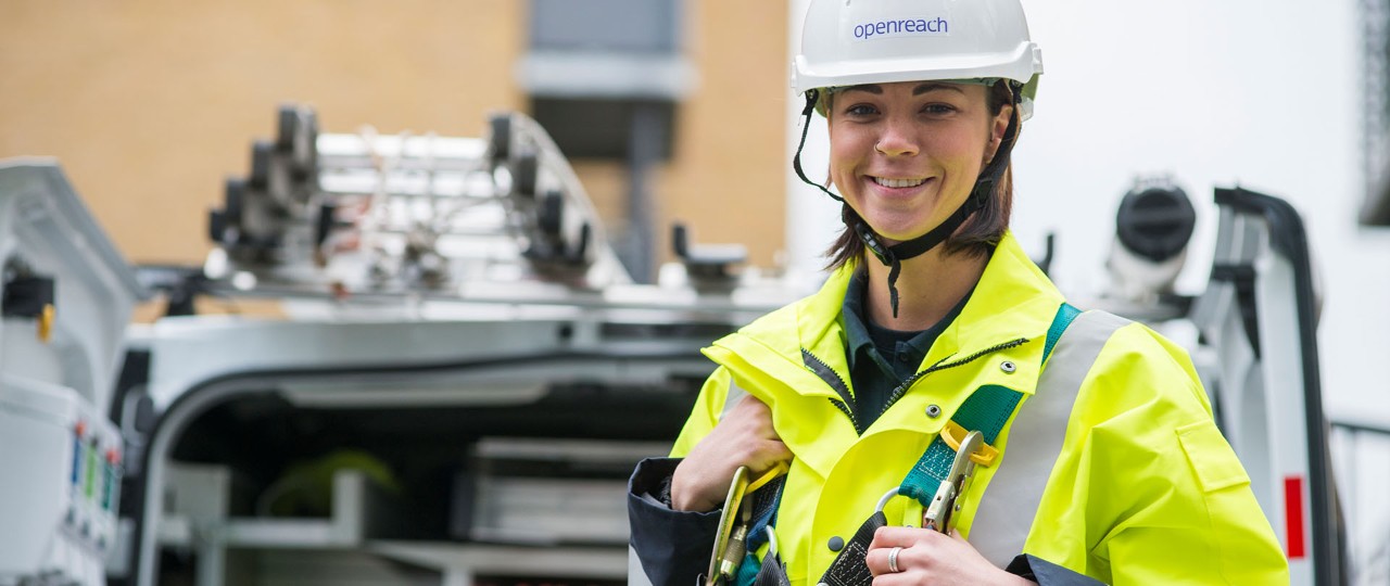 Women smiling wearing a helmet