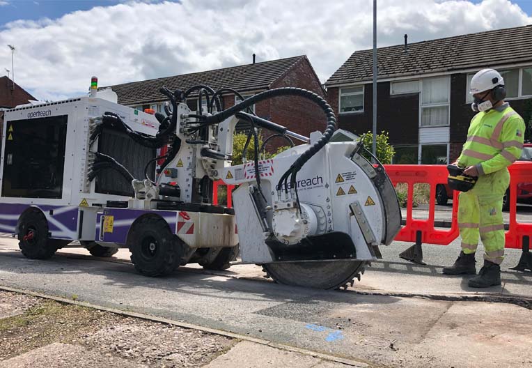Image of a civil engineer using a remote controlled trench cutter
