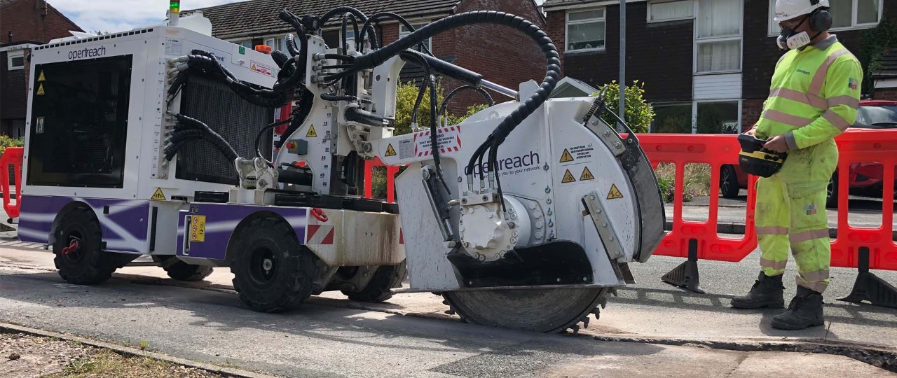 Image of a civil engineer using a remote controlled trench cutter