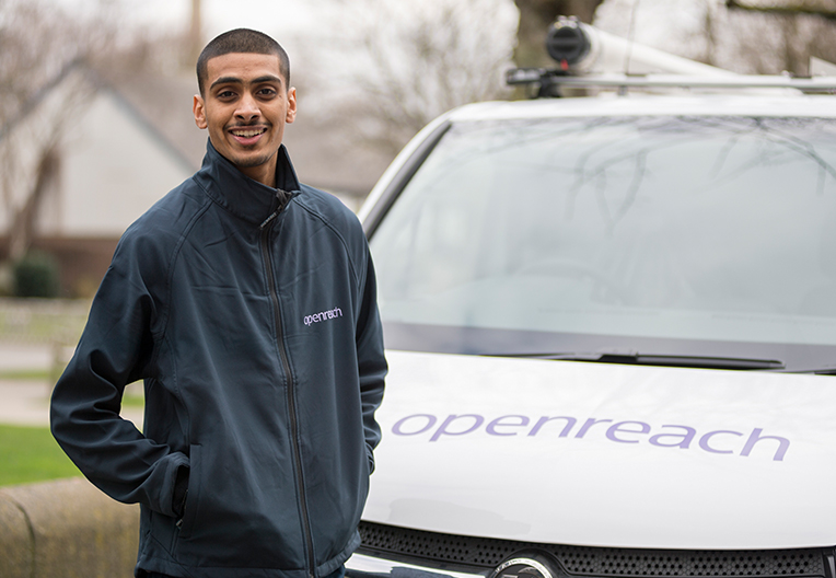 An engineer by his van
