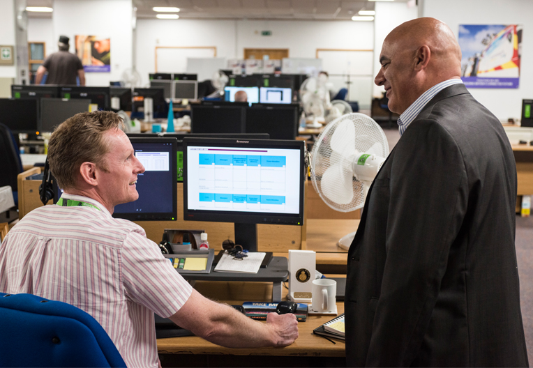 Manager talking with one of his team