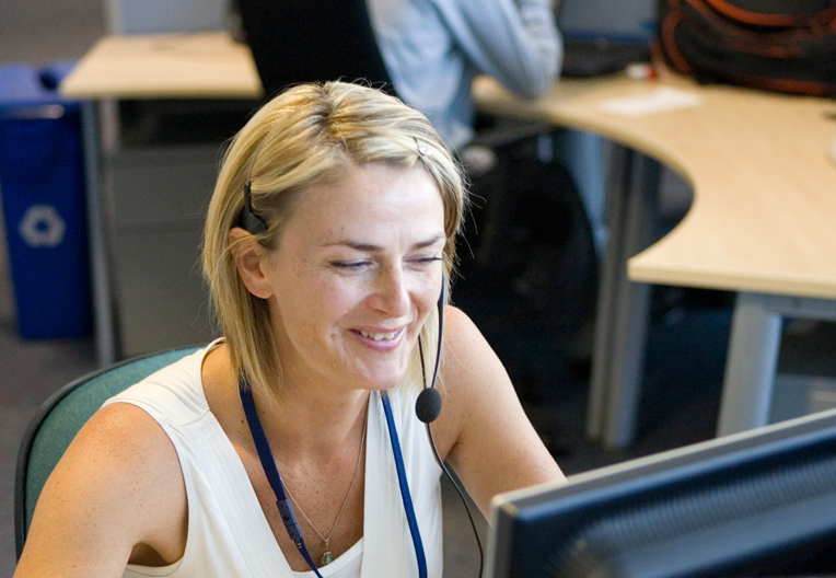 Image of office worker wearing a headset