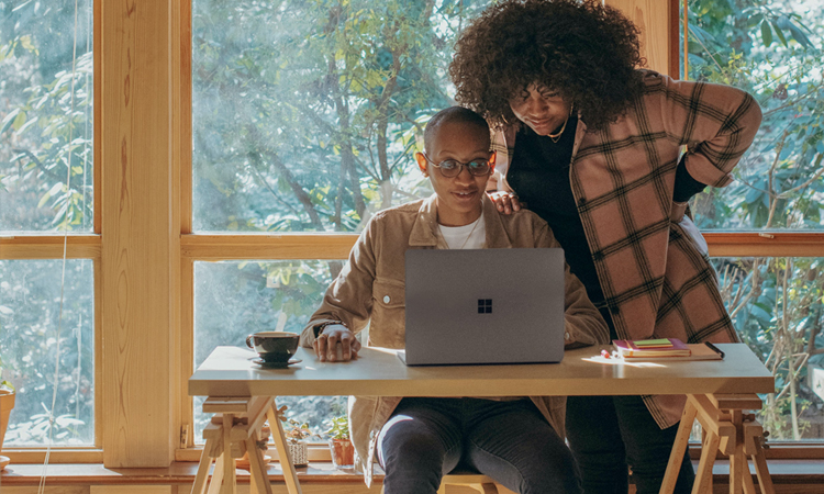 Couple looking at laptop