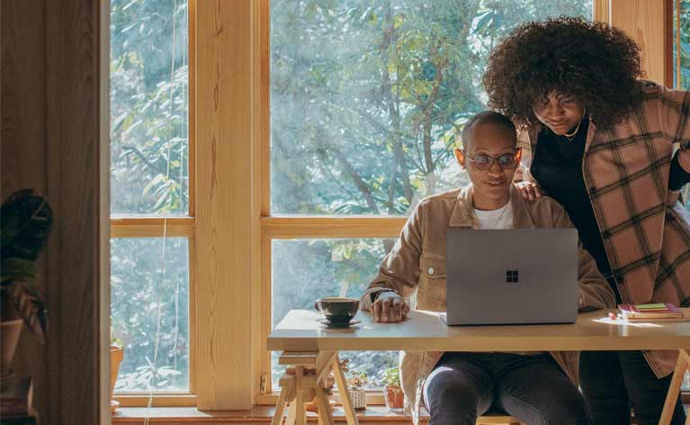 CFP Image of man and woman using laptop in home
