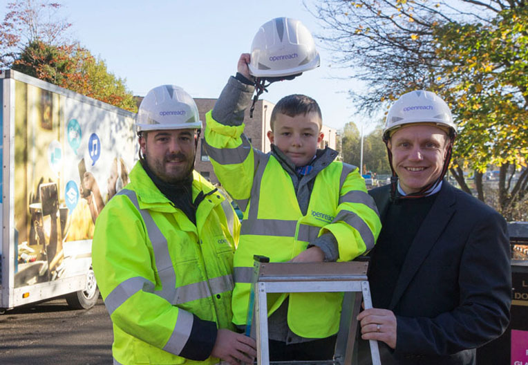 Image of Cameron Francis with Openreach engineers.