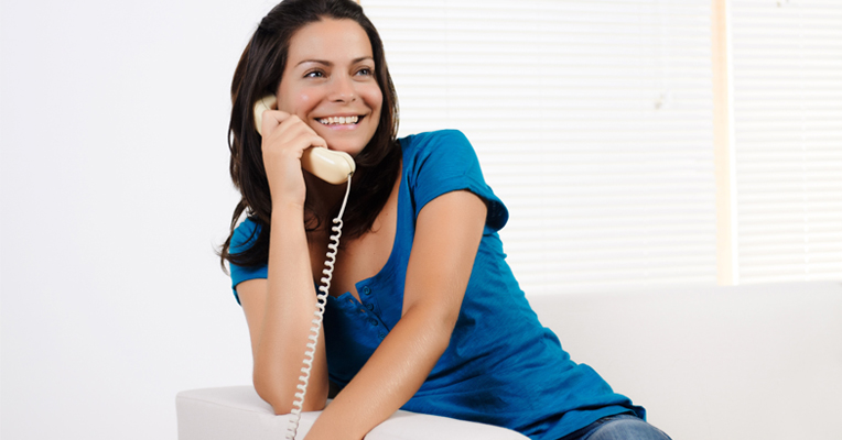 Image of a woman chatting on the phone