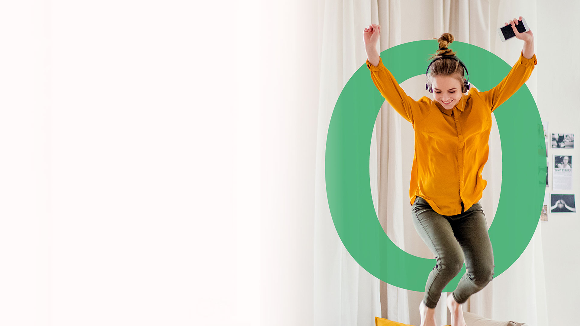 Woman celebrating at home after getting Full Fibre broadband installed