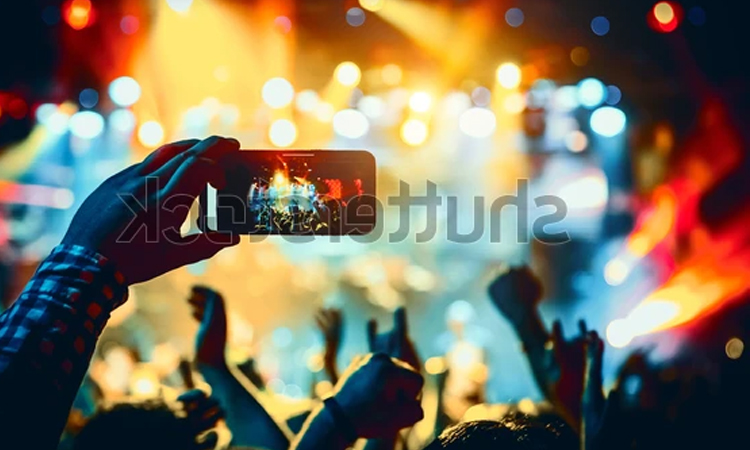 Festival goers taking photos