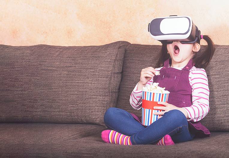 Little girl experiencing virtual reality