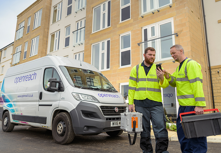 Engineers arriving at an apartment block