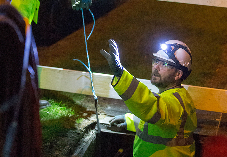 Civil engineer installing fibre