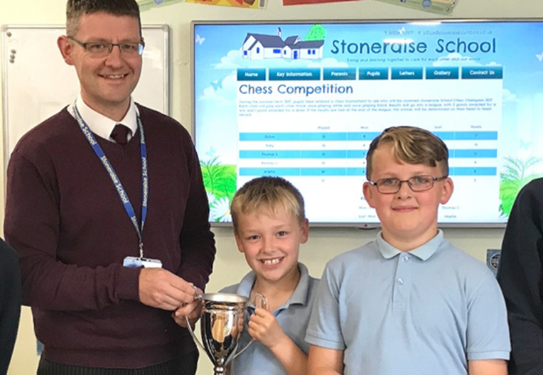 Teacher and pupils at Cumbrian school