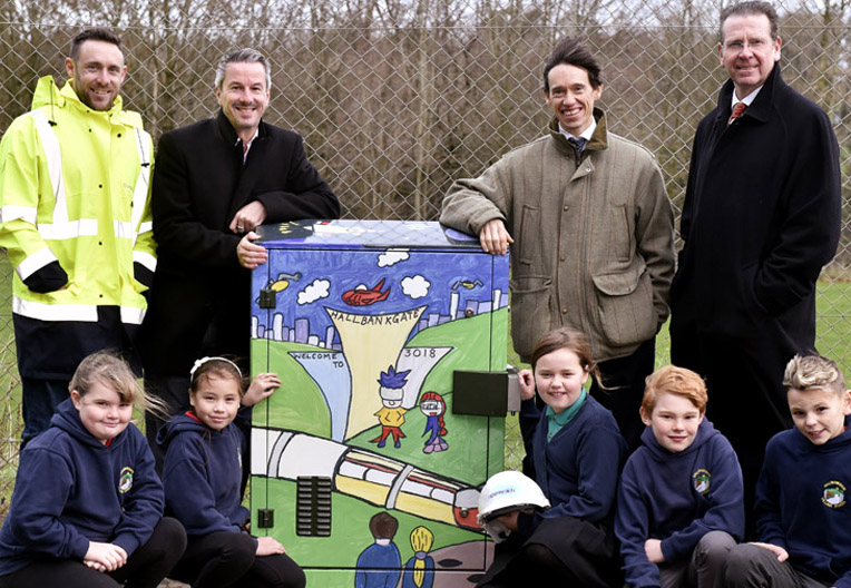 Image of cumbrian school children by street cabinet