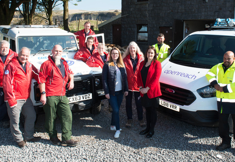 Image of cave rescue team with an Openreach engineer