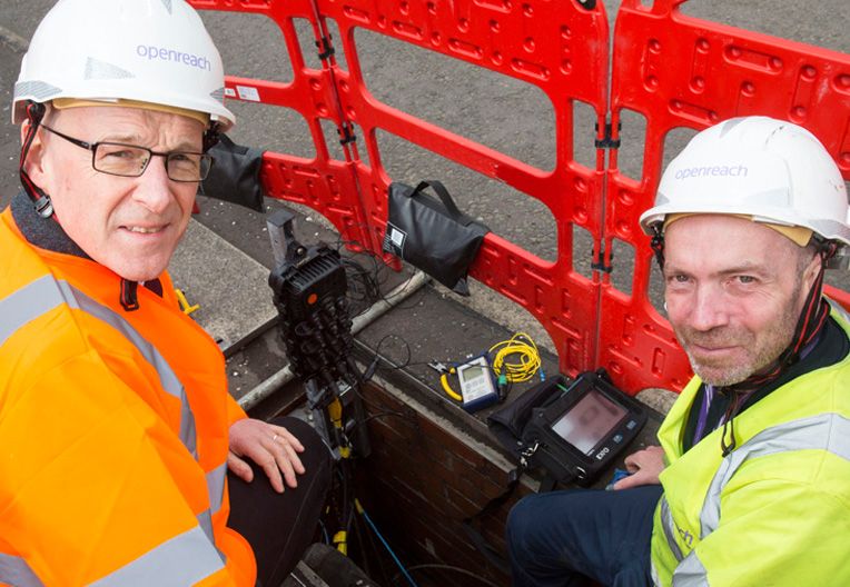 Image of John Swinney with an engineer